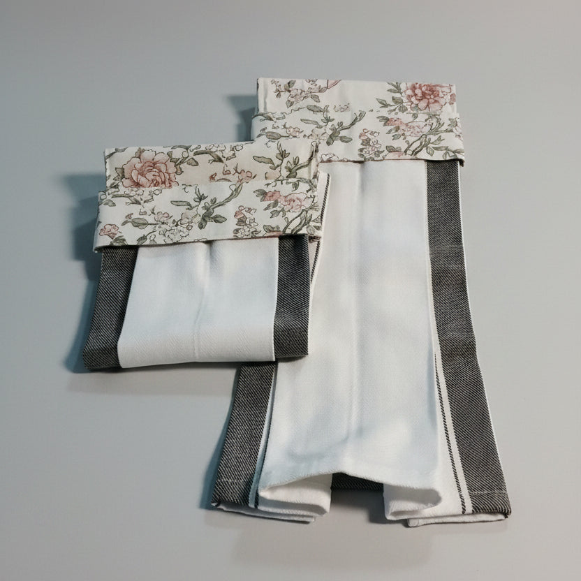 Set of fabric swatches with floral patterns on a dark background
